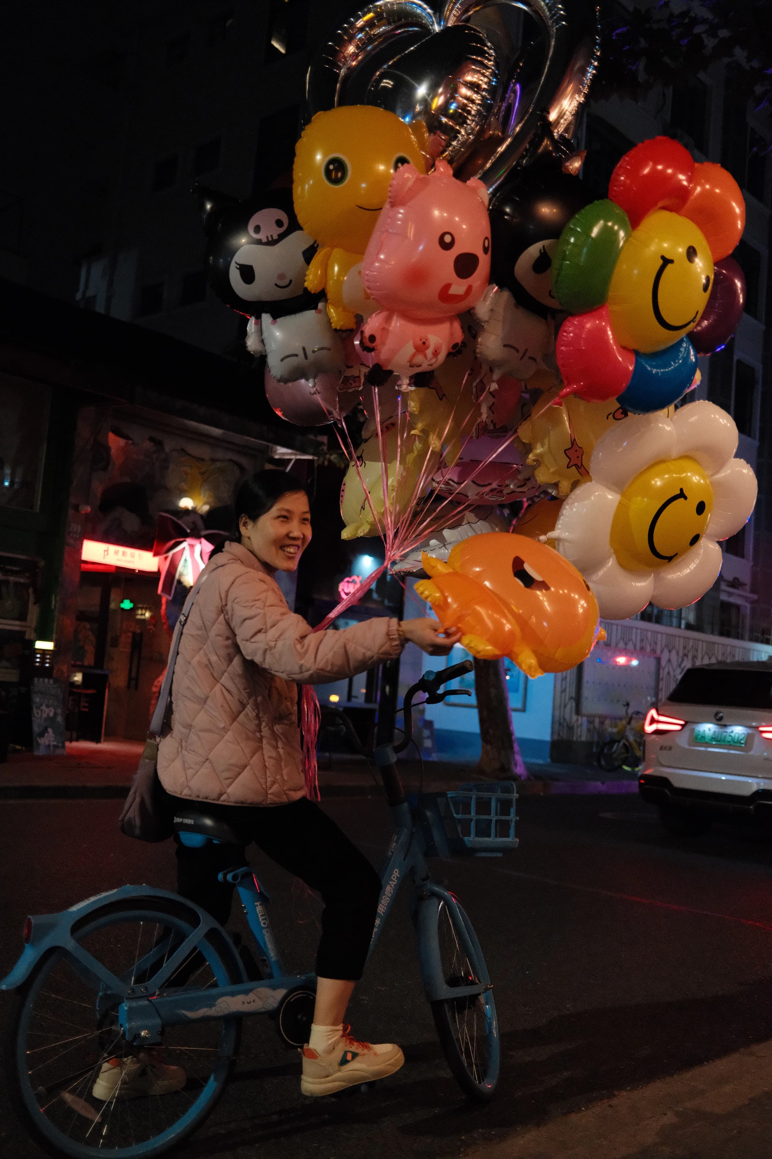 Selling smiles is her job.