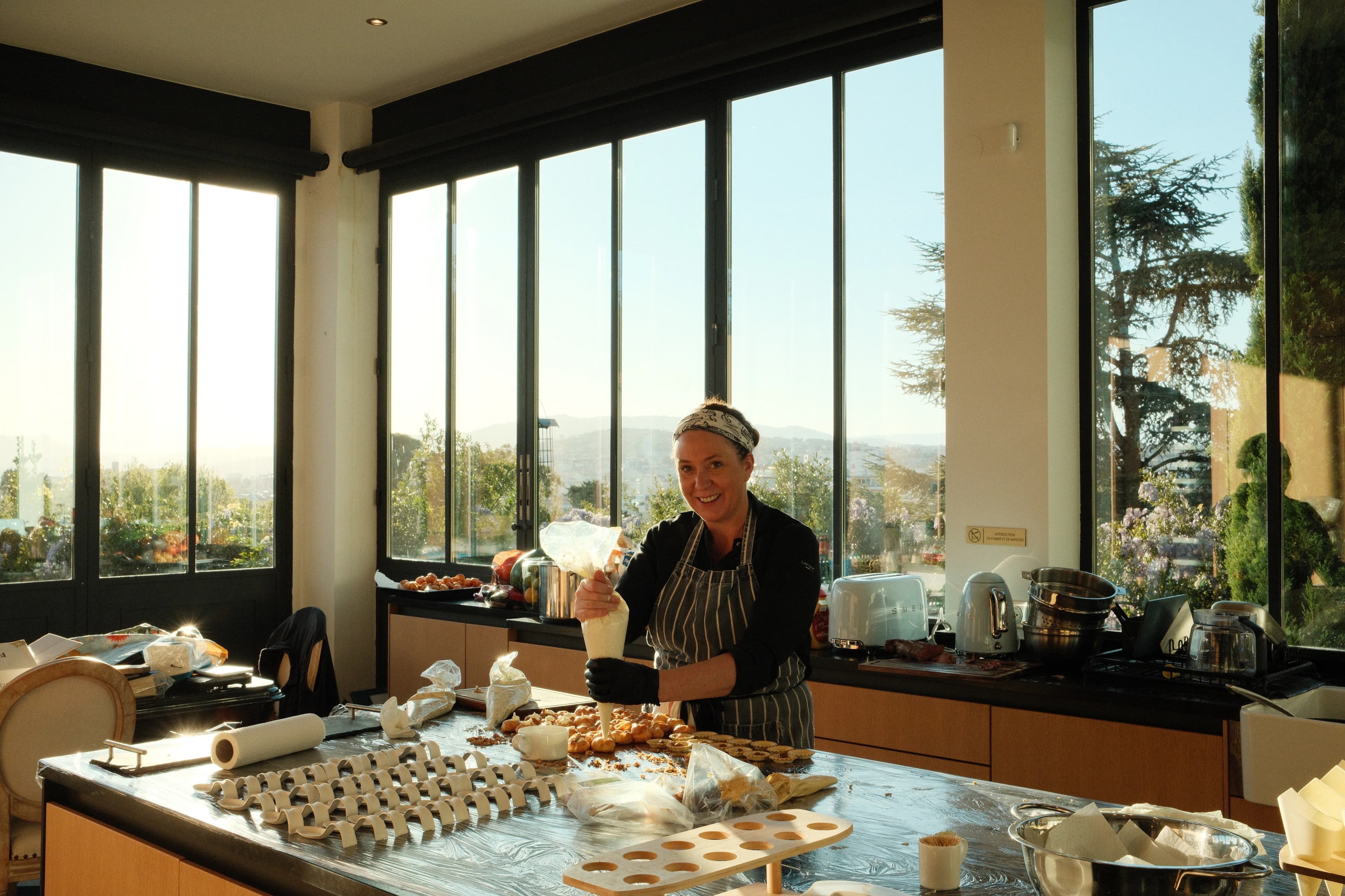A lady cooking in Cannes.